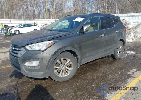2014 Hyundai Santa Fe Sport 2.4L z USA, uszkodzony, nr VIN 5XYZUDLB4EG140392